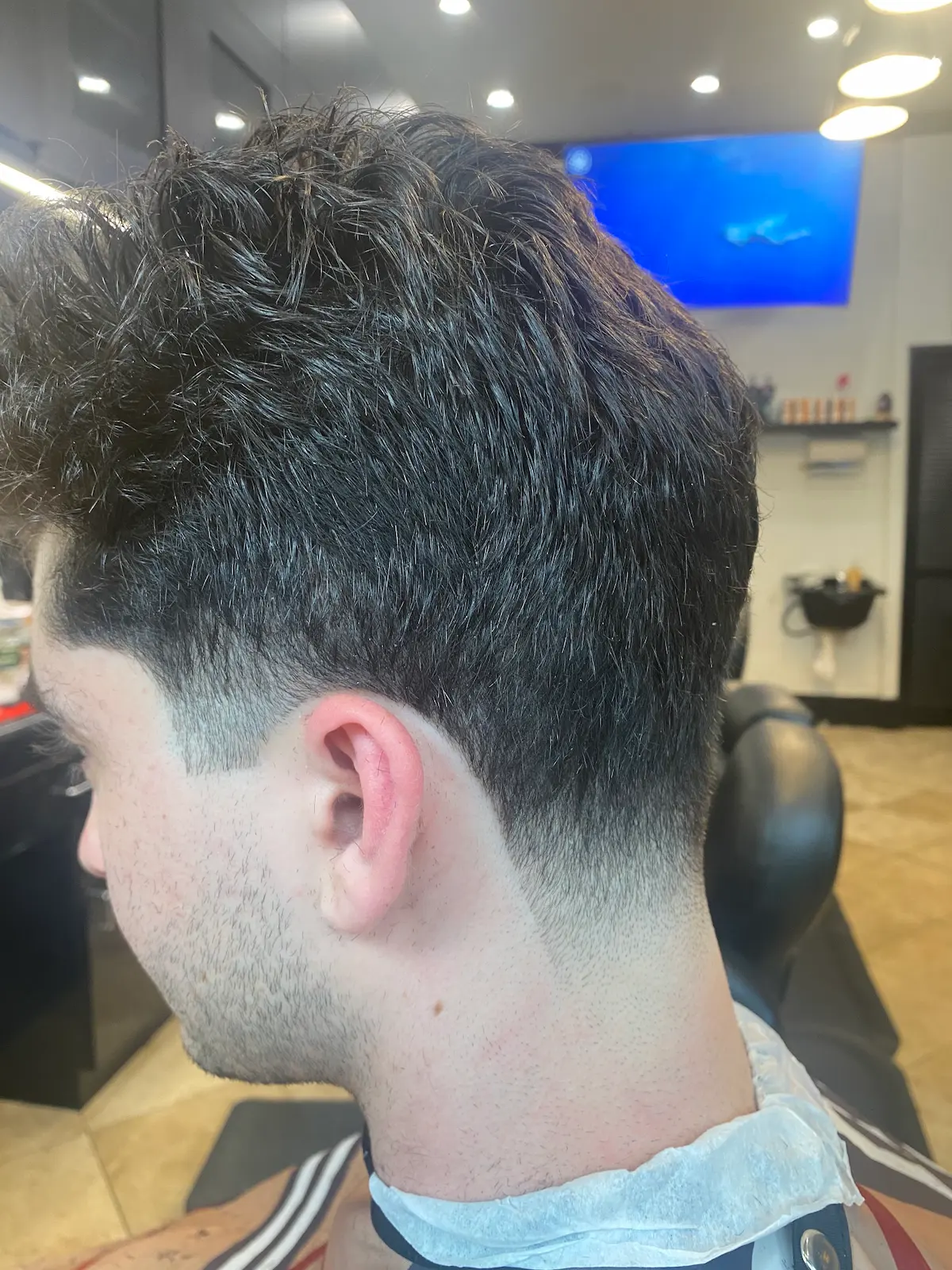 Clean taper haircut with soft blend